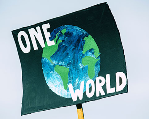 One World banner<br />
Photo by Markus Spiske on Unsplash