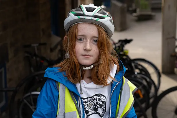 Girl learning cycle proficiency